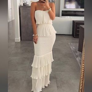 Fun white dress perfect for engagement photos!